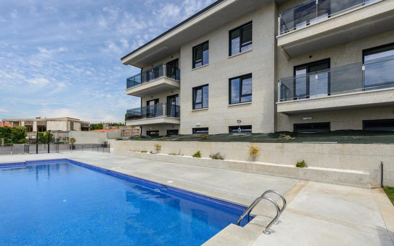 Apartamentos Onzamar 桑亨霍 外观 照片