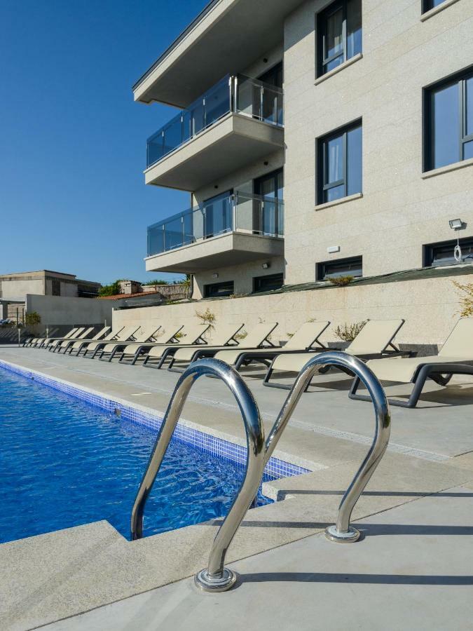 Apartamentos Onzamar 桑亨霍 外观 照片