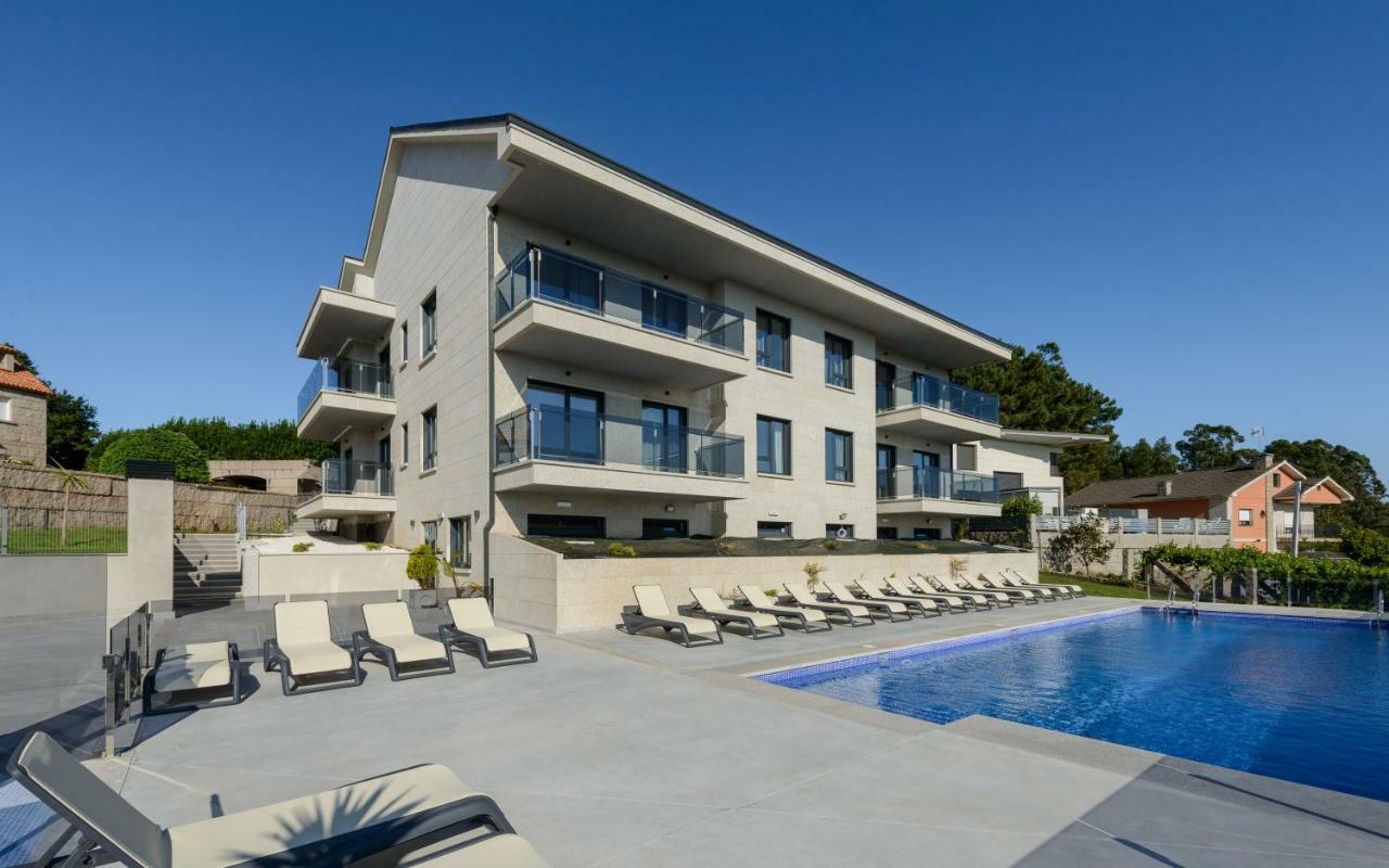 Apartamentos Onzamar 桑亨霍 外观 照片