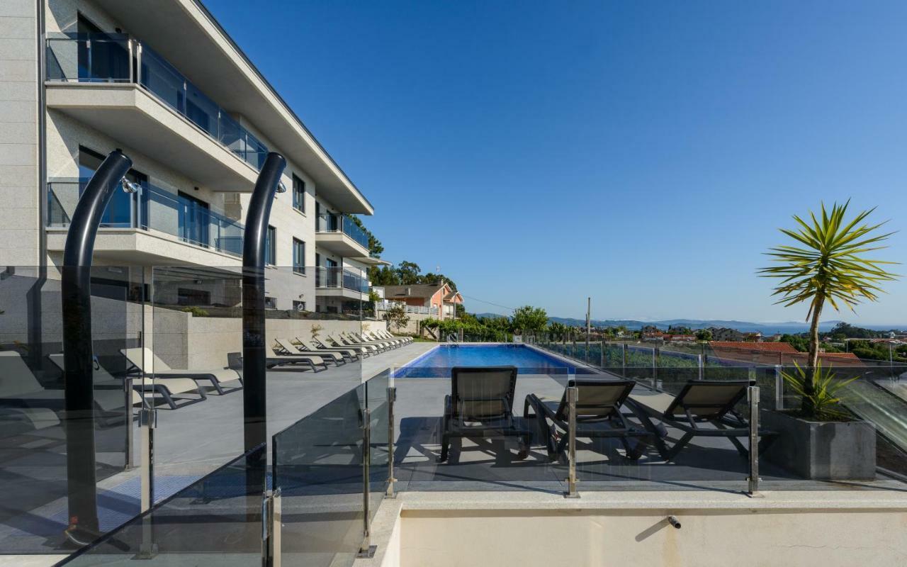 Apartamentos Onzamar 桑亨霍 外观 照片